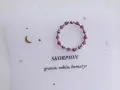 Pierścionek z granatu, rubinu i hematytu dla Skorpiona. Ten szczęśliwy kamień przynosi moc i pewność siebie.